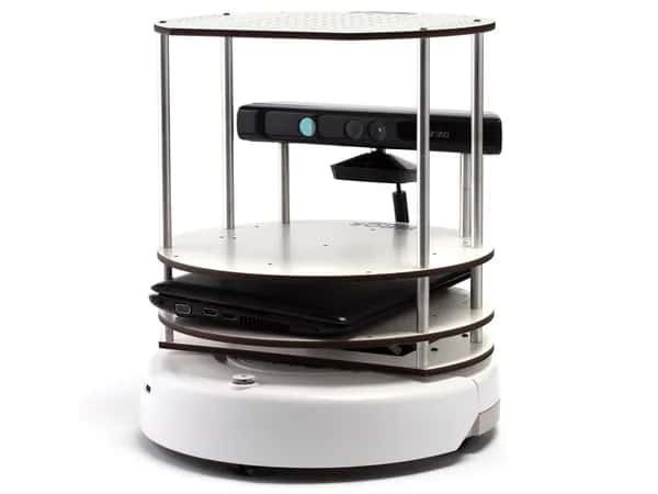 TurtleBot — белый робот из нескольких ярусов круглых пластин на широком круглом основании.