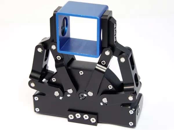 Adaptive Gripper — двупалый чёрный захват удерживает синий куб.