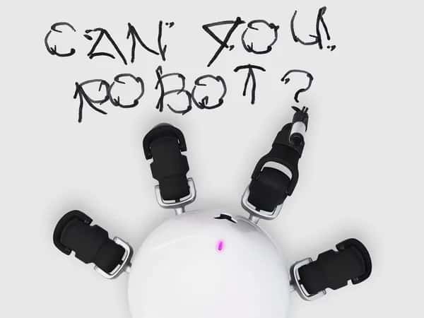 Одна из четырёх видимых ног HEXA держит маркер — робот написал «Can you robot?».
