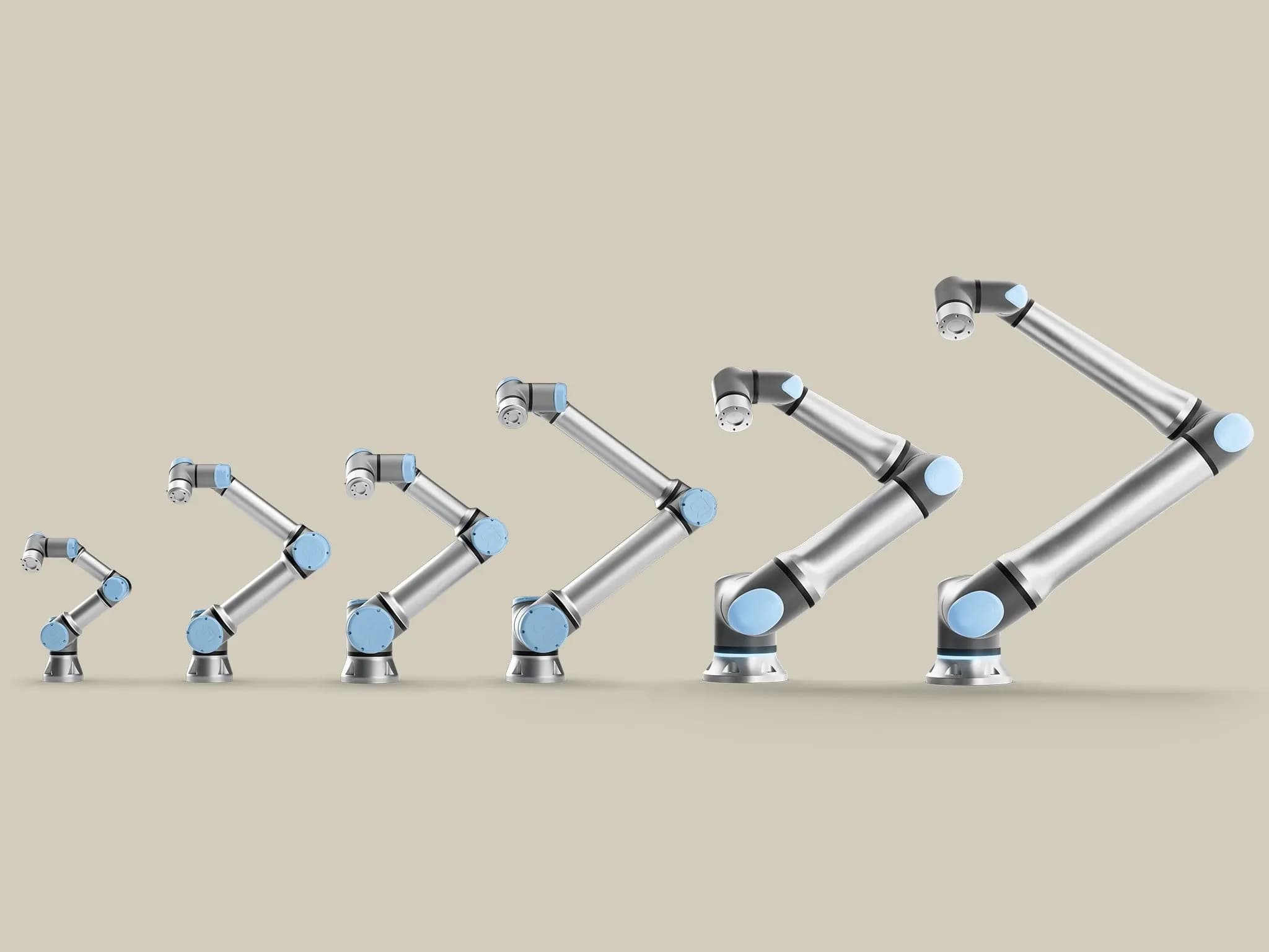 Шесть версий шарнирных коботов-манипуляторов Universal Robots — от меньшего к большему, в серебристо-синей гамме.