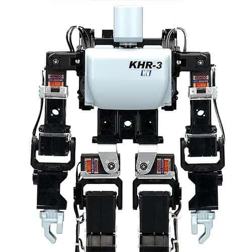 KHR-3 — небольшой двуногий игрушечный робот: белые корпус и голова, чёрные руки и ноги, клешни-захваты.